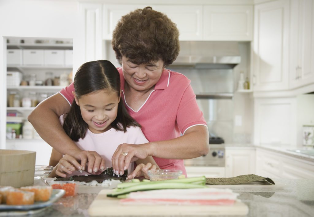 Lifestyle_Stock_Grandmother_Granddaughter_Cooking_39637389